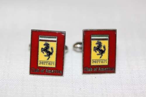 An extremely rare set of vintage (c1960's) Ferrari Club of America silver metal enamelled cuff-links