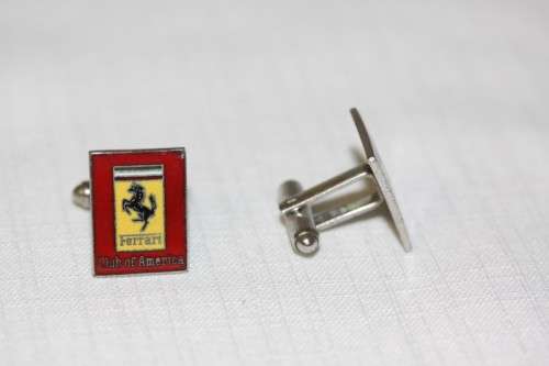 An extremely rare set of vintage (c1960's) Ferrari Club of America silver metal enamelled cuff-links