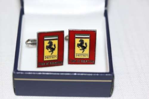 An extremely rare set of vintage (c1960's) Ferrari Club of America silver metal enamelled cuff-links
