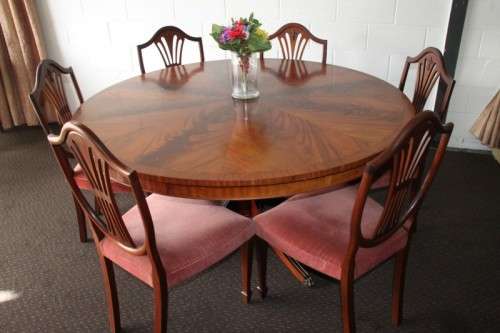 A magnificent round Kingwood inlay/ finished dining table with solid brass lion feet caps - STUNNING