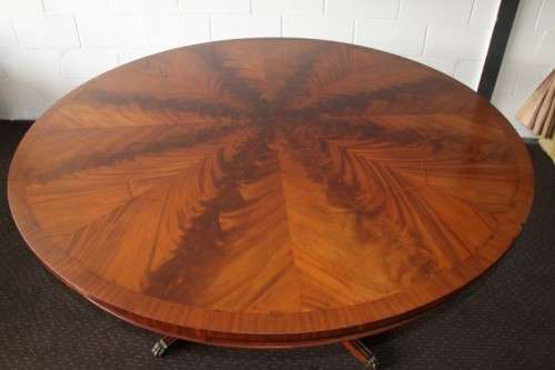 A magnificent round Kingwood inlay/ finished dining table with solid brass lion feet caps - STUNNING