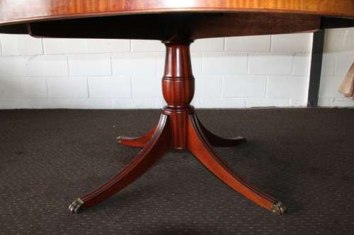 A magnificent round Kingwood inlay/ finished dining table with solid brass lion feet caps - STUNNING