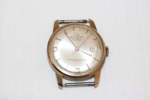 An incredible vintage Swiss made 21 Jewell "Buler" Calendar Nivarox Gents gold plated watch