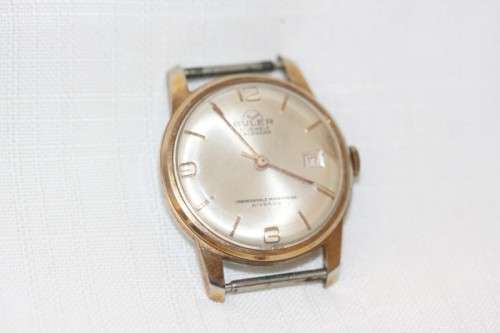 An incredible vintage Swiss made 21 Jewell "Buler" Calendar Nivarox Gents gold plated watch