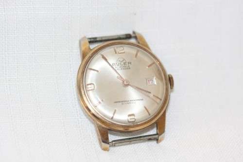 An incredible vintage Swiss made 21 Jewell "Buler" Calendar Nivarox Gents gold plated watch