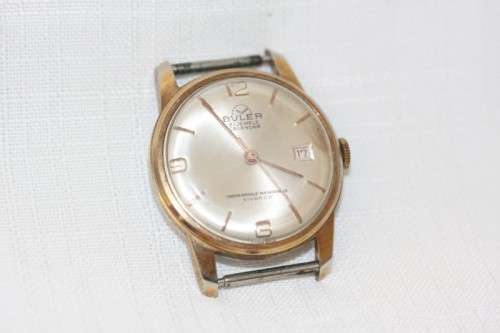 An incredible vintage Swiss made 21 Jewell "Buler" Calendar Nivarox Gents gold plated watch