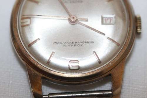 An incredible vintage Swiss made 21 Jewell "Buler" Calendar Nivarox Gents gold plated watch