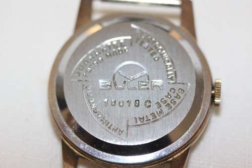 An incredible vintage Swiss made 21 Jewell "Buler" Calendar Nivarox Gents gold plated watch