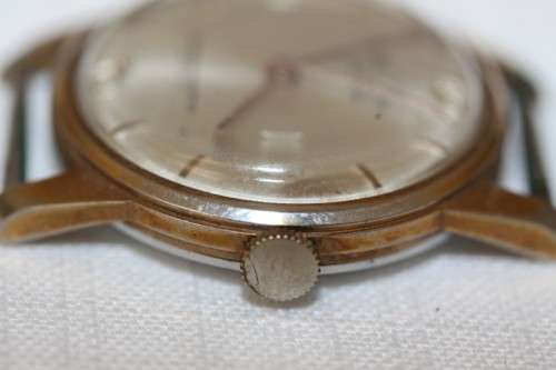 An incredible vintage Swiss made 21 Jewell "Buler" Calendar Nivarox Gents gold plated watch