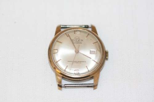 An incredible vintage Swiss made 21 Jewell "Buler" Calendar Nivarox Gents gold plated watch