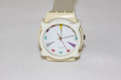 An amazing vintage (1980's) Uni-sex Swiss made Swatch "Tutti Frutti" watch with a watch guard cover