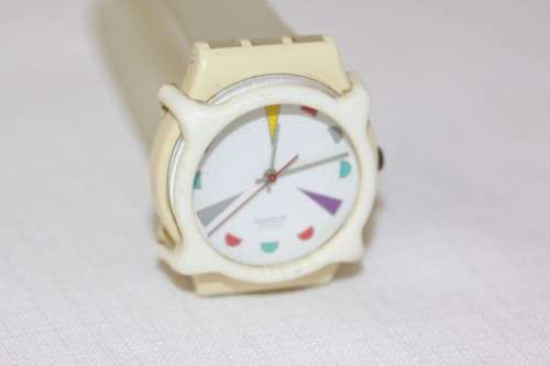 An amazing vintage (1980's) Uni-sex Swiss made Swatch "Tutti Frutti" watch with a watch guard cover