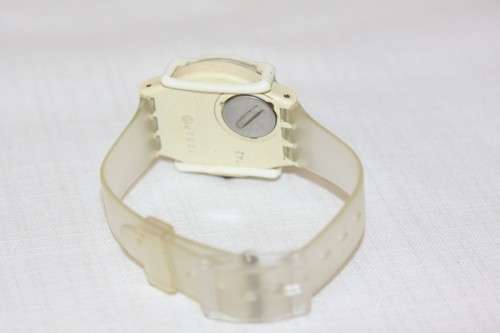 An amazing vintage (1980's) Uni-sex Swiss made Swatch "Tutti Frutti" watch with a watch guard cover
