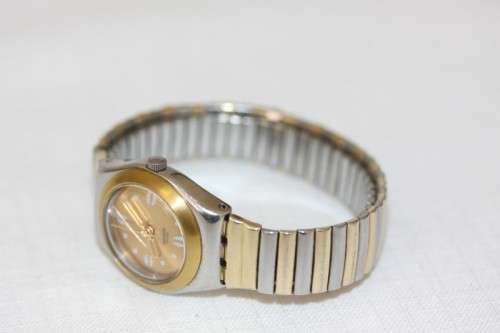 A beautiful Swiss made two-tone (Silver & gold) Swatch "Irony" ladies watch in working condition