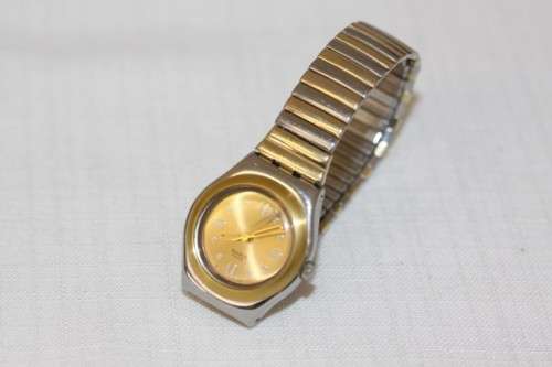 A beautiful Swiss made two-tone (Silver & gold) Swatch "Irony" ladies watch in working condition