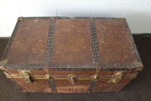 A wonderful large vintage travel/ storage trunk - ideal for extra storage in the house