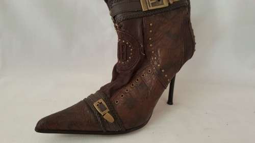 A beautiful and very sexy pair of brown ladies 1to3 mid-calf "studded" stiletto heel zip-up boots
