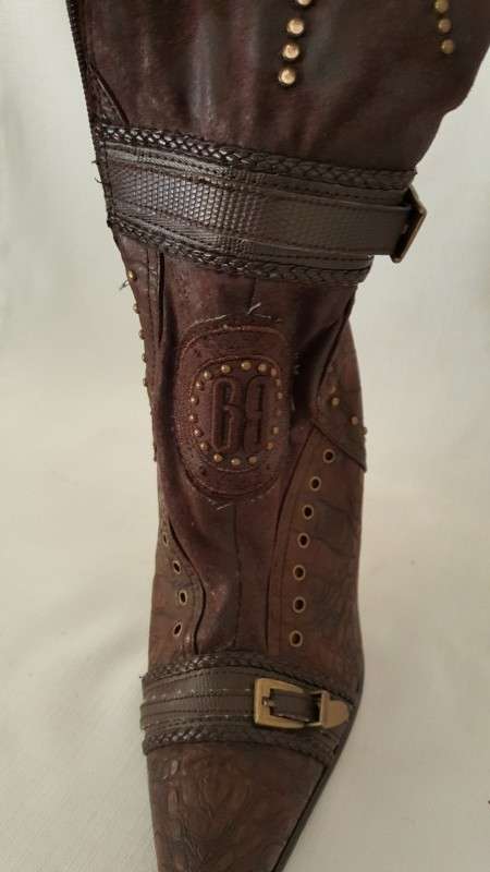 A beautiful and very sexy pair of brown ladies 1to3 mid-calf "studded" stiletto heel zip-up boots