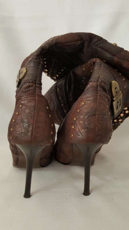 A beautiful and very sexy pair of brown ladies 1to3 mid-calf "studded" stiletto heel zip-up boots