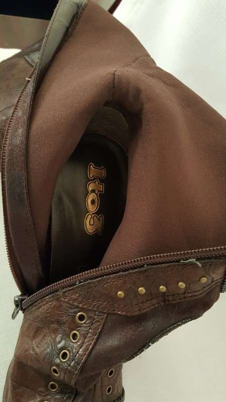 A beautiful and very sexy pair of brown ladies 1to3 mid-calf "studded" stiletto heel zip-up boots