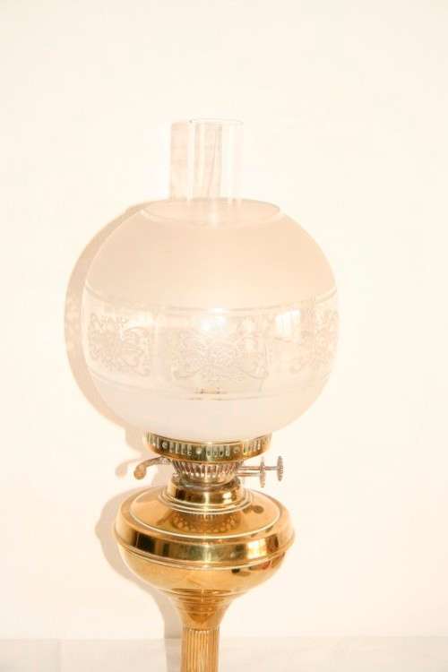 A magnificent tall antique solid brass "double-wick" paraffin lamp w/ snuffer & frosted glass shade
