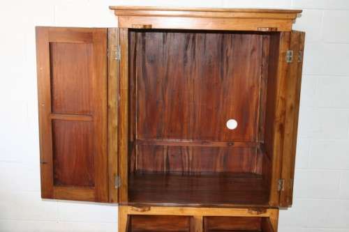 A magnificent Indonesian teak entertainment cabinet with traditional solid brass embellishments