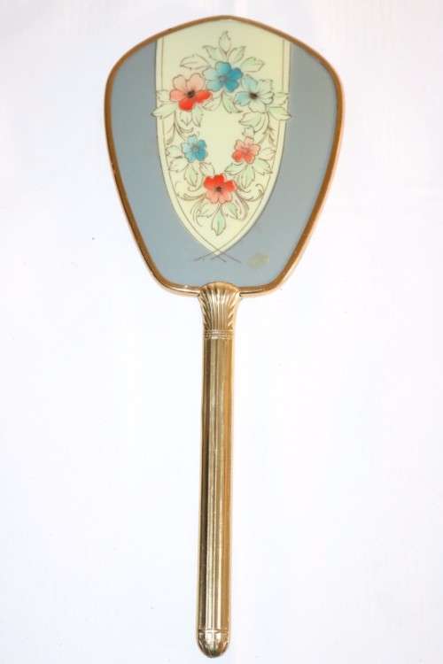 A wonderfully elegant vintage hand mirror with bevelled glass in great condition - RS17Sale