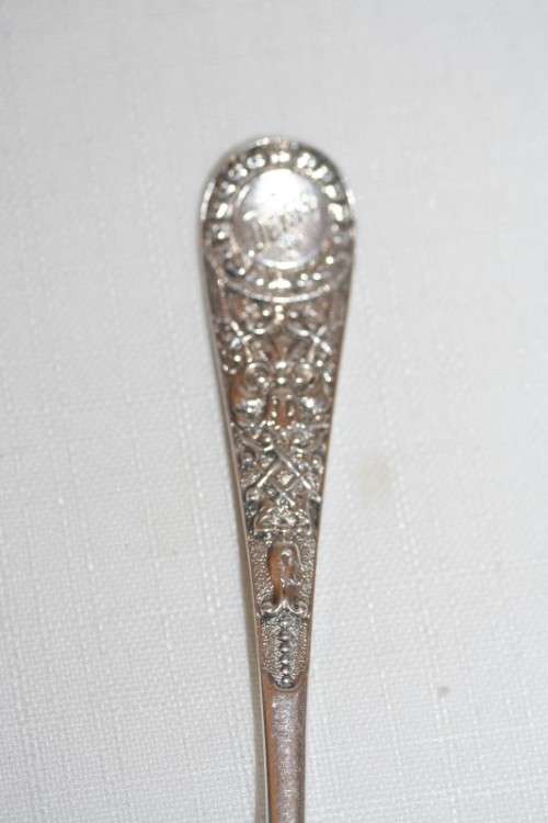 A magnificent antique hallmarked sterling silver "James Dixon & Sons" boxed fork and spoon set