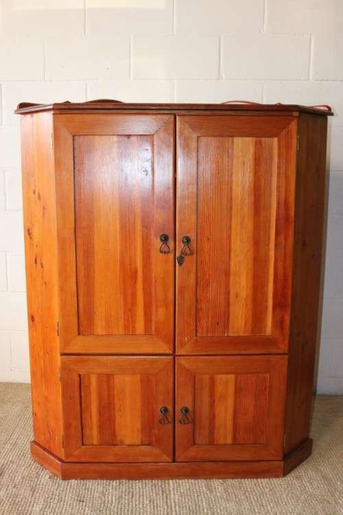 A solid Oregon pine corner display cabinet with a large cupboard. Stunning in any home!!