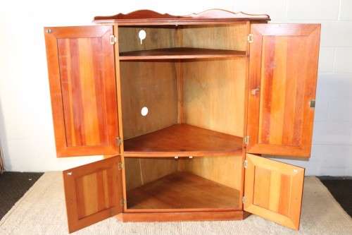 A solid Oregon pine corner display cabinet with a large cupboard. Stunning in any home!!