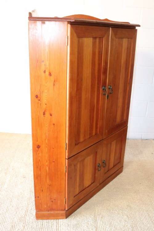 A solid Oregon pine corner display cabinet with a large cupboard. Stunning in any home!!