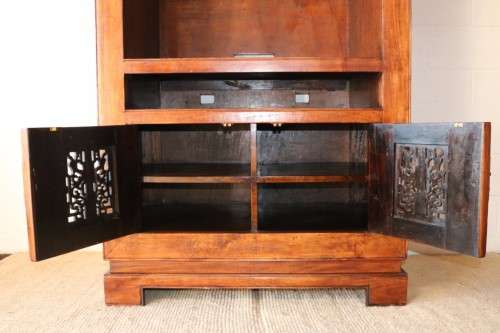 A spectacular Burmese teak entertainment cabinet with traditional solid brass embellishments