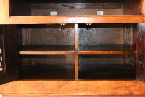 A spectacular Burmese teak entertainment cabinet with traditional solid brass embellishments