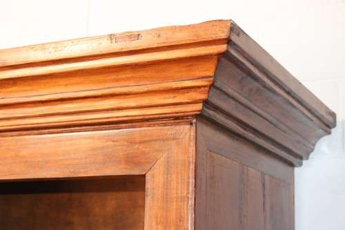 A spectacular Burmese teak entertainment cabinet with traditional solid brass embellishments