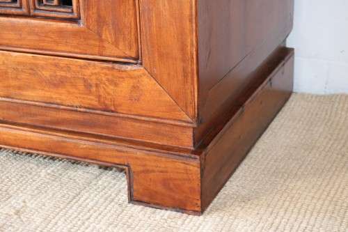 A spectacular Burmese teak entertainment cabinet with traditional solid brass embellishments
