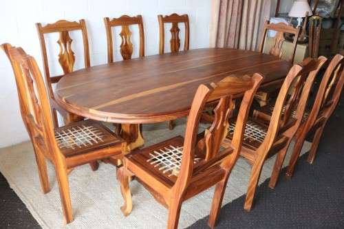 An absolutely magnificent African Blackwood 8-seater dining suite in exquisite condition - WOW