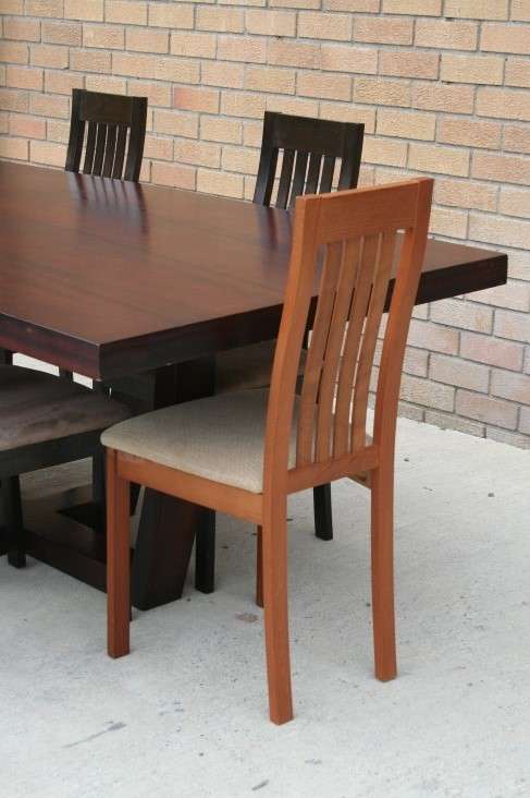 An awesome and stylish modern-styled 6 to 8 seater dining suite in excellent condition
