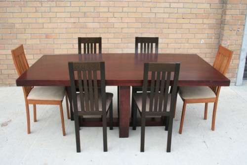 An awesome and stylish modern-styled 6 to 8 seater dining suite in excellent condition