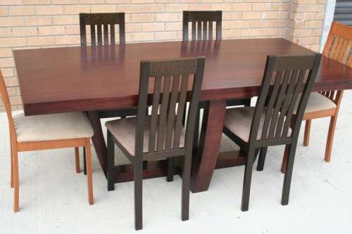 An awesome and stylish modern-styled 6 to 8 seater dining suite in excellent condition