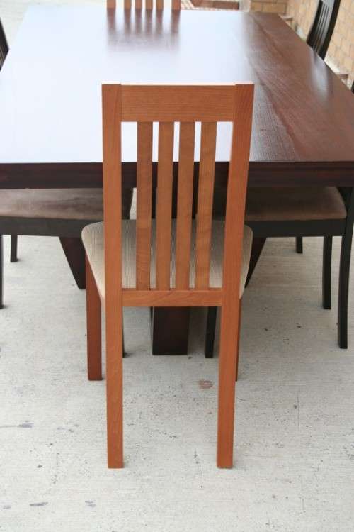 An awesome and stylish modern-styled 6 to 8 seater dining suite in excellent condition