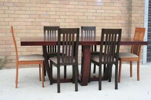 An awesome and stylish modern-styled 6 to 8 seater dining suite in excellent condition