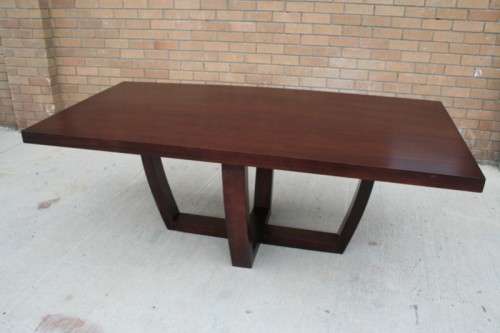 An awesome and stylish modern-styled 6 to 8 seater dining suite in excellent condition