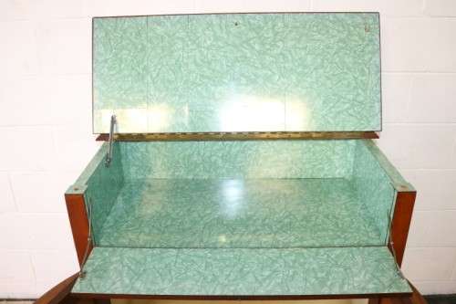 A remarkable Art Deco oak drinks cabinet with fall down counter and spacious cupboards