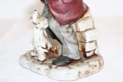 Three wonderful ceramic figurines of men with musical instruments with hand painted detailing