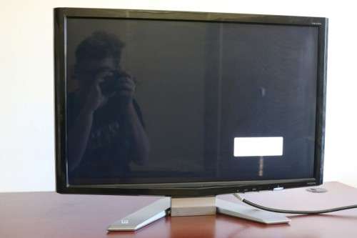 An Acer P243W HD computer monitor (24' LCD) on a stand with an HDMI port - full working condition