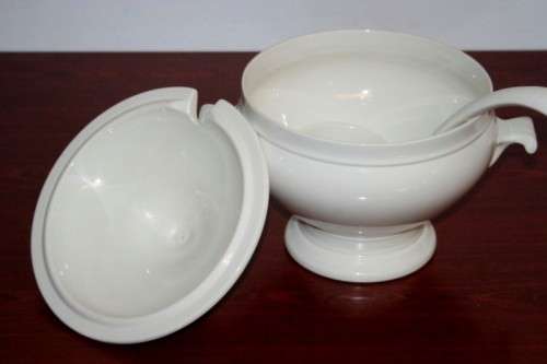An exquisite Belgian made Royal Boch "Classic" Ivory porcelain lidded soup tureen with a large ladle