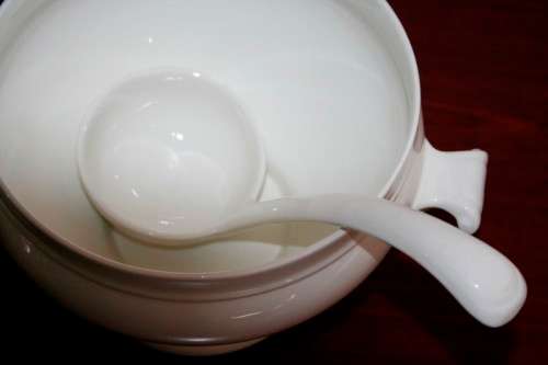 An exquisite Belgian made Royal Boch "Classic" Ivory porcelain lidded soup tureen with a large ladle