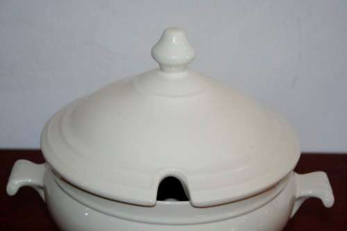 An exquisite Belgian made Royal Boch "Classic" Ivory porcelain lidded soup tureen with a large ladle