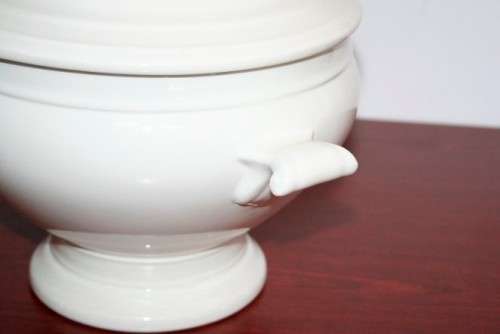 An exquisite Belgian made Royal Boch "Classic" Ivory porcelain lidded soup tureen with a large ladle