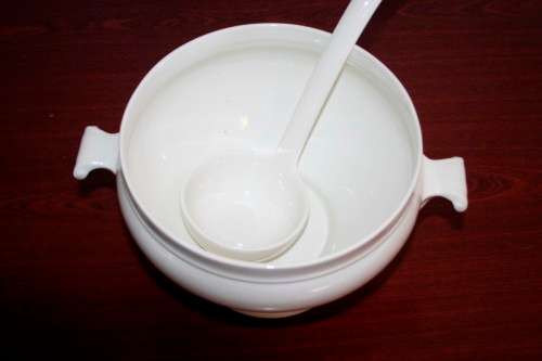 An exquisite Belgian made Royal Boch "Classic" Ivory porcelain lidded soup tureen with a large ladle